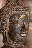 Vientiane, Laos - Wat Si Saket, The gallery around the sim houses thousands of Buddha statues in various mudras, dating  from the 16th century. 